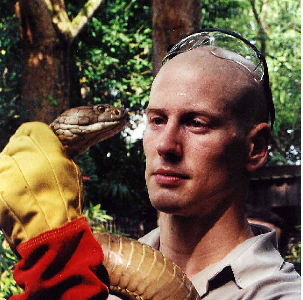 SPEAKER: Professor Bryan Grieg Fry with a king cobra. SPEAKER: Professor Bryan Grieg Fry with a king cobra.